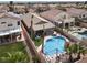 Aerial view of a backyard with a pool, spa, and lush landscaping at 1229 Swanbrooke Dr, Las Vegas, NV 89144