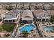 Aerial view of a backyard with a pool, spa, landscaping, and patio area at 1229 Swanbrooke Dr, Las Vegas, NV 89144
