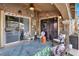 Cozy covered patio with comfortable seating, perfect for outdoor entertaining and relaxation at 1229 Swanbrooke Dr, Las Vegas, NV 89144