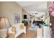Bright and airy living room with laminate floors and an open concept design at 1229 Swanbrooke Dr, Las Vegas, NV 89144