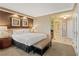 Spacious bedroom boasting modern decor with ensuite bathroom and vanity area at 125 E Harmon Ave # 2318, Las Vegas, NV 89109