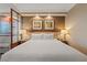 Bright bedroom featuring king bed, modern lamps, and neutral wall decor at 125 E Harmon Ave # 2318, Las Vegas, NV 89109