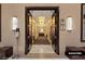 Elevator lobby with seating area and modern light fixtures at 125 E Harmon Ave # 2318, Las Vegas, NV 89109