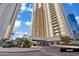 Lush landscaping and a valet area enhance the entrance of the Signature at MGM Grand at 125 E Harmon Ave # 2318, Las Vegas, NV 89109