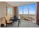 Office area boasts incredible city views from a large picture window at 125 E Harmon Ave # 2318, Las Vegas, NV 89109