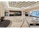 Spacious lobby with decorative tile flooring, column and seating area at 125 E Harmon Ave # 2318, Las Vegas, NV 89109