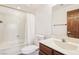 Bathroom featuring a shower/tub combo and traditional vanity with a marble-look countertop at 1404 Santa Margarita St # D, Las Vegas, NV 89146