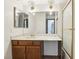 Bathroom with a shower, sink, and vanity with marble-look countertop at 1404 Santa Margarita St # D, Las Vegas, NV 89146