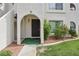 Condo front door with desert landscaping, rock mulch and maintained walkway at 1404 Santa Margarita St # D, Las Vegas, NV 89146