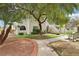 Charming condo with lush landscaping, mature trees and a well-maintained walkway at 1404 Santa Margarita St # D, Las Vegas, NV 89146