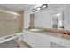 Bathroom features a glass-enclosed shower, tile floor, and large vanity at 1440 Vegas Valley Dr # 1, Las Vegas, NV 89169