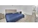Bedroom features neutral decor and tile flooring at 1440 Vegas Valley Dr # 1, Las Vegas, NV 89169