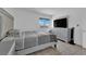 Bright bedroom featuring tile flooring, closet, and a window at 1440 Vegas Valley Dr # 1, Las Vegas, NV 89169
