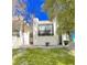 Charming two-story condo with a well-maintained lawn and mature trees at 1440 Vegas Valley Dr # 1, Las Vegas, NV 89169