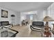 The spacious living area features tile floors and contemporary furnishings and ample natural light at 1440 Vegas Valley Dr # 1, Las Vegas, NV 89169