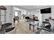 Expansive living space showcasing the dining area, kitchen, and living room with tile floors at 1440 Vegas Valley Dr # 1, Las Vegas, NV 89169