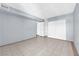 Spacious bedroom features tile flooring, blue walls and ample closet space at 1440 Vegas Valley Dr # 14, Las Vegas, NV 89169