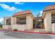 Inviting condo featuring a stucco exterior, balcony, and a red tile roof at 1440 Vegas Valley Dr # 14, Las Vegas, NV 89169