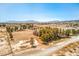 An aerial view displays the property's extensive lot, rural setting, and surrounding landscape at 1911 Jarvis Rd, Pahrump, NV 89060