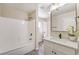 Bathroom featuring a tub/shower combo and a vanity at 1911 Jarvis Rd, Pahrump, NV 89060