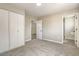 Bedroom with carpet flooring, neutral walls, closet, and interior doors at 1911 Jarvis Rd, Pahrump, NV 89060