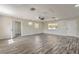 Open living space with an airy feel, featuring stylish flooring, updated fixtures, and two entry doors at 1911 Jarvis Rd, Pahrump, NV 89060
