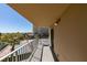 The balcony overlooks the tennis courts and community, offering an inviting outdoor living experience at 205 E Harmon Ave # 511, Las Vegas, NV 89169