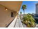 Picturesque balcony view with palm trees swaying in the breeze and a view of the buildings in the distance at 205 E Harmon Ave # 511, Las Vegas, NV 89169
