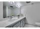Modern bathroom featuring double sinks, sleek fixtures, and a large mirror for a bright, open feel at 205 E Harmon Ave # 511, Las Vegas, NV 89169