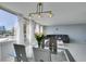Bright dining area with modern table set and large windows offering city views at 205 E Harmon Ave # 511, Las Vegas, NV 89169