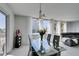 Bright dining area with modern table set, art display, and large windows at 205 E Harmon Ave # 511, Las Vegas, NV 89169