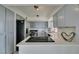 Charming kitchen featuring grey cabinets, updated appliances, and sleek countertops at 205 E Harmon Ave # 511, Las Vegas, NV 89169