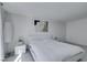 Contemporary main bedroom with a sleek, minimalist design, enhanced by a large rose painting above the bed at 205 E Harmon Ave # 511, Las Vegas, NV 89169