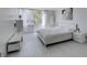 Bright main bedroom featuring modern decor, tiled floor, and large windows with beautiful outside views at 205 E Harmon Ave # 511, Las Vegas, NV 89169