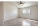 Bright, empty bedroom with neutral paint, window and tiled floor at 2073 Paterno Ave, Las Vegas, NV 89123