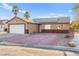 Cozy single-Gathering home with solar panels, driveway, and low-water landscaping at 2315 Opponents Ridge St, North Las Vegas, NV 89032