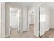 Hallway with access to bathroom, bedroom, and linen closet at 2315 Opponents Ridge St, North Las Vegas, NV 89032