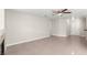 Large open living space with sleek tile floors and plenty of natural light, modern fireplace at 2315 Opponents Ridge St, North Las Vegas, NV 89032