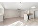 Bright living room featuring tile flooring, fireplace, and a modern chandelier fixture at 2315 Opponents Ridge St, North Las Vegas, NV 89032