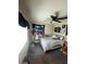 Bedroom with carpet floors, ceiling fan, and window at 2409 W Gilmore Ave, North Las Vegas, NV 89032