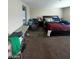 A large bedroom with carpeted floors at 2409 W Gilmore Ave, North Las Vegas, NV 89032