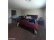 This is a large carpeted bedroom at 2409 W Gilmore Ave, North Las Vegas, NV 89032