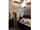 Bedroom with closet, ceiling fan, and dresser at 2409 W Gilmore Ave, North Las Vegas, NV 89032