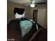 Spacious bedroom featuring a ceiling fan and closet at 2409 W Gilmore Ave, North Las Vegas, NV 89032
