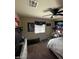 Bedroom featuring a bed with decor, a window, and carpeted flooring at 2409 W Gilmore Ave, North Las Vegas, NV 89032