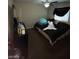 A cozy bedroom with a ceiling fan at 2409 W Gilmore Ave, North Las Vegas, NV 89032