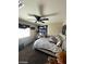 Bedroom featuring a bed with decor, a window, and carpeted flooring at 2409 W Gilmore Ave, North Las Vegas, NV 89032