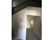 Hallway with tile floor leading to the living areas at 2409 W Gilmore Ave, North Las Vegas, NV 89032