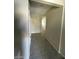 Hallway with tile floor leading to the living areas at 2409 W Gilmore Ave, North Las Vegas, NV 89032