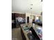 Open kitchen area with stainless appliances and a large island great for entertaining at 2409 W Gilmore Ave, North Las Vegas, NV 89032